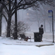 Illinois State Police urged motorists to stay off roads Thursday after as much as 4 inches of wind-blown snow led to whiteout conditions and multiple pileups.